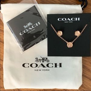 New in bag, never opened Coach necklace and earring set